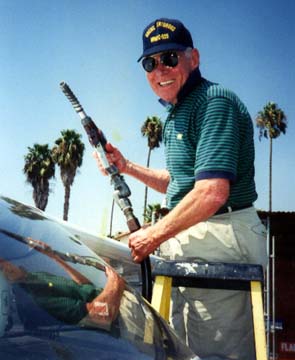 Tom pumping gas